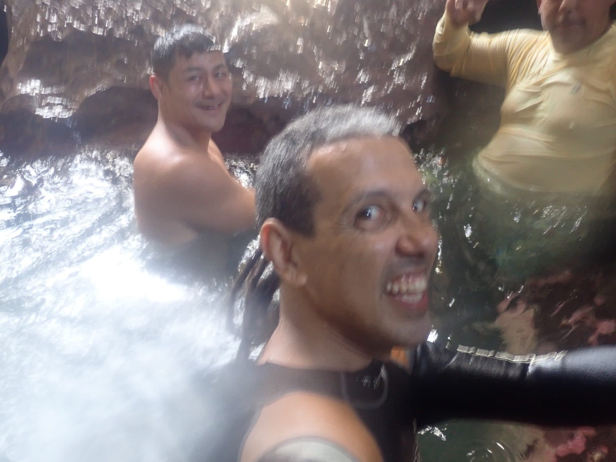 Jesús and guests in the cave whirlpool