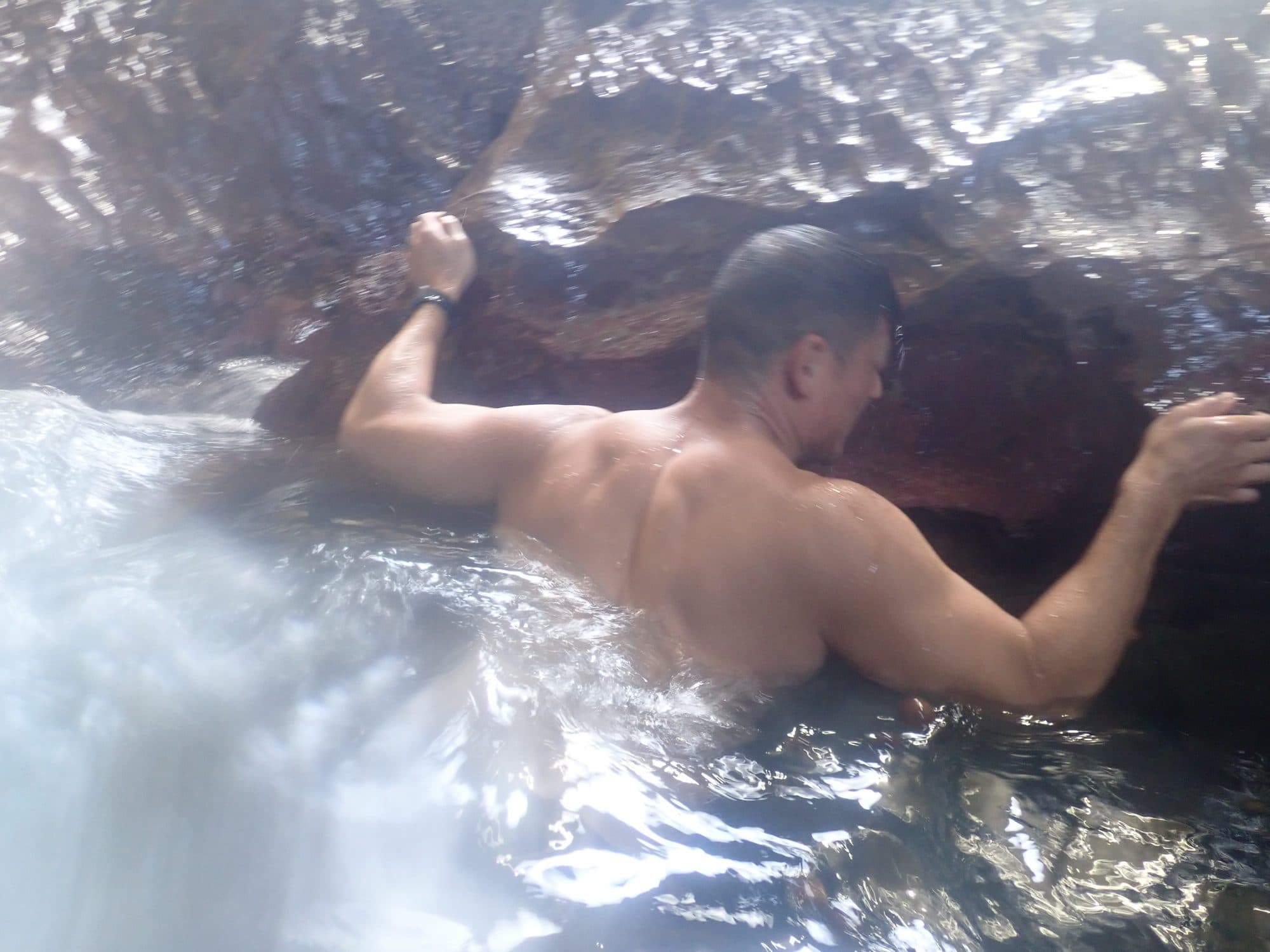 Guest in the seawater whirlpool inside the cave