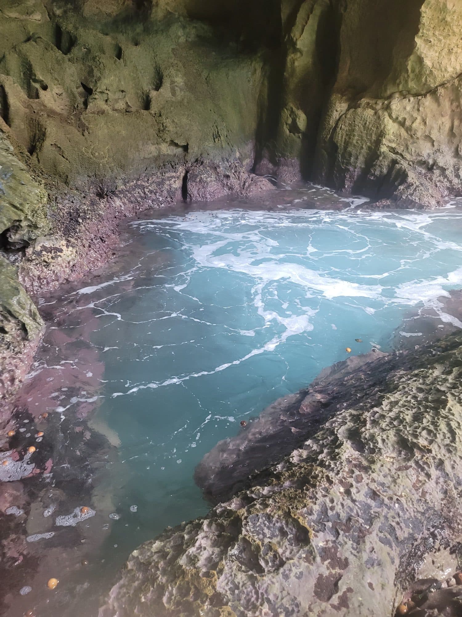 Seawater whirlpool pool inside the cave
